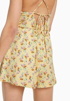 BERSHKA Floral Print With Straps- Jumpsuit - Light Yellow -Bershka 04283dd538fa4488812e53e38e2c8d41